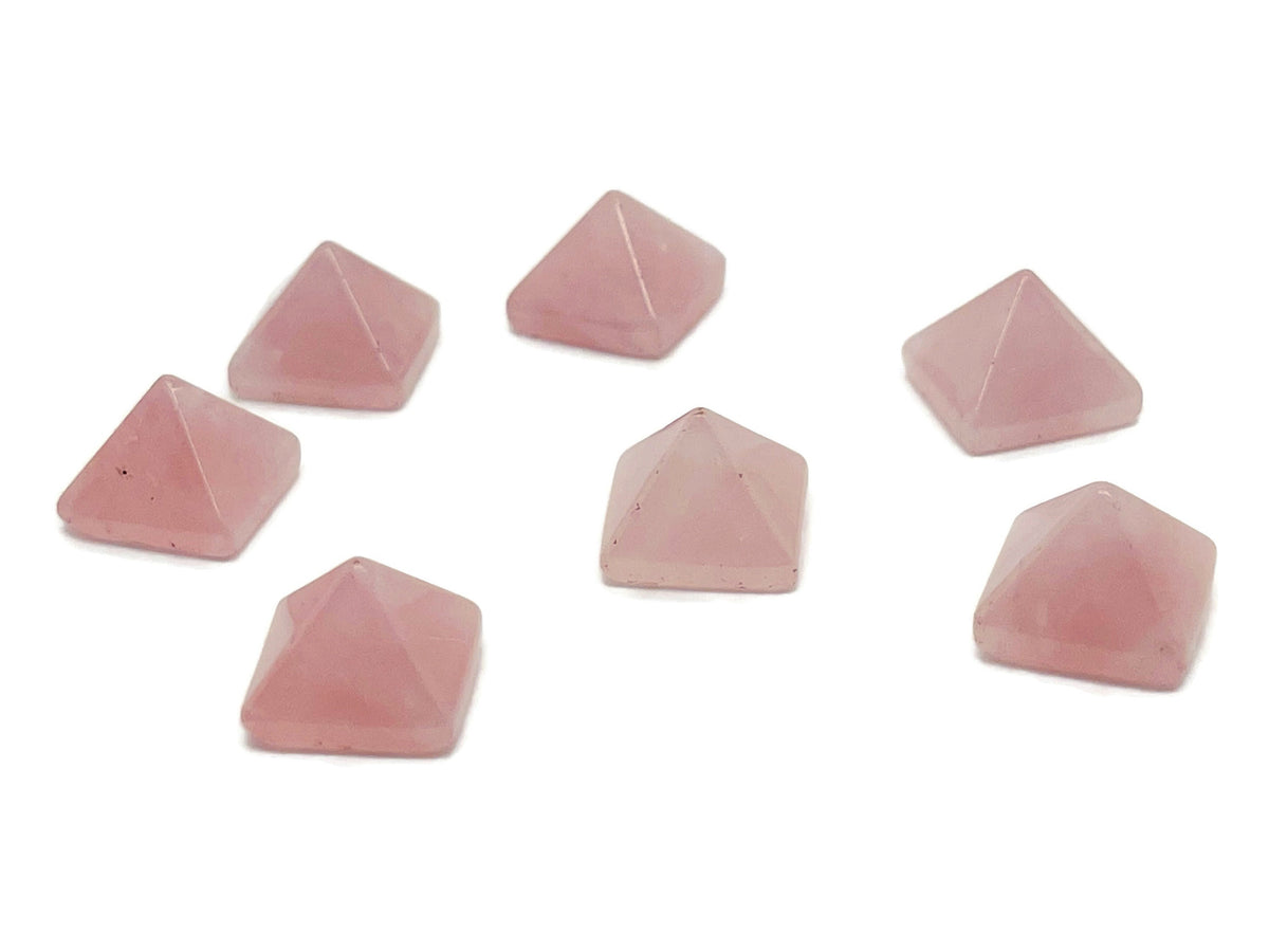 Rose quartz pyramid gemstone carving, 14mm, from GemstoneGO, showcasing a polished pink stone pyramid with smooth surfaces.