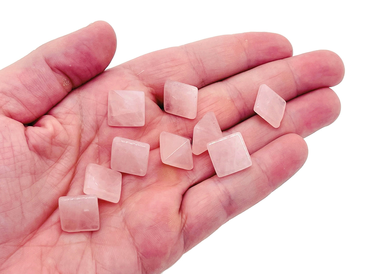 Rose Quartz pyramid gemstone carving, 14mm, from GemstoneGO, showcasing a polished pink quartz pyramid with natural gemstone details.