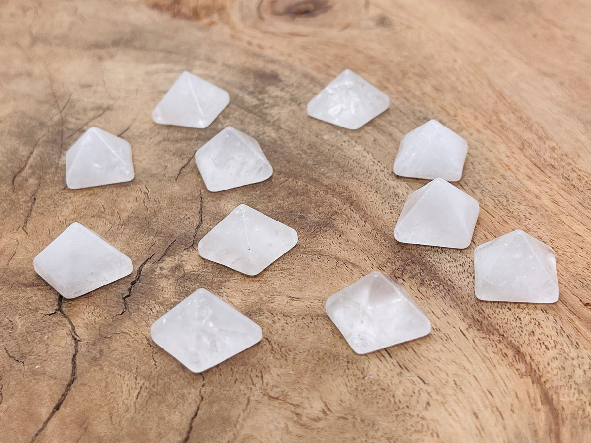 14mm clear quartz pyramid gemstone carving from GemstoneGO, showcasing a transparent, polished pyramid with natural quartz clarity.