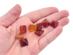 14mm Carnelian pyramid gemstone carving from GemstoneGO, showcasing a vibrant orange, polished pyramid-shaped stone.