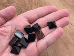 Black Agate pyramid gemstone carving, 14mm, with detailed natural stone texture and polished finish.