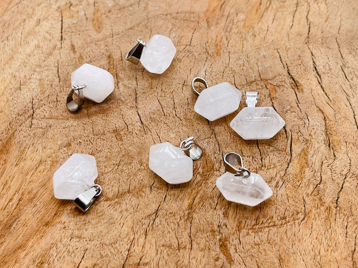 Clear Quartz point crystal pendant from GemstoneGO, showcasing a natural, polished gemstone for jewelry making.