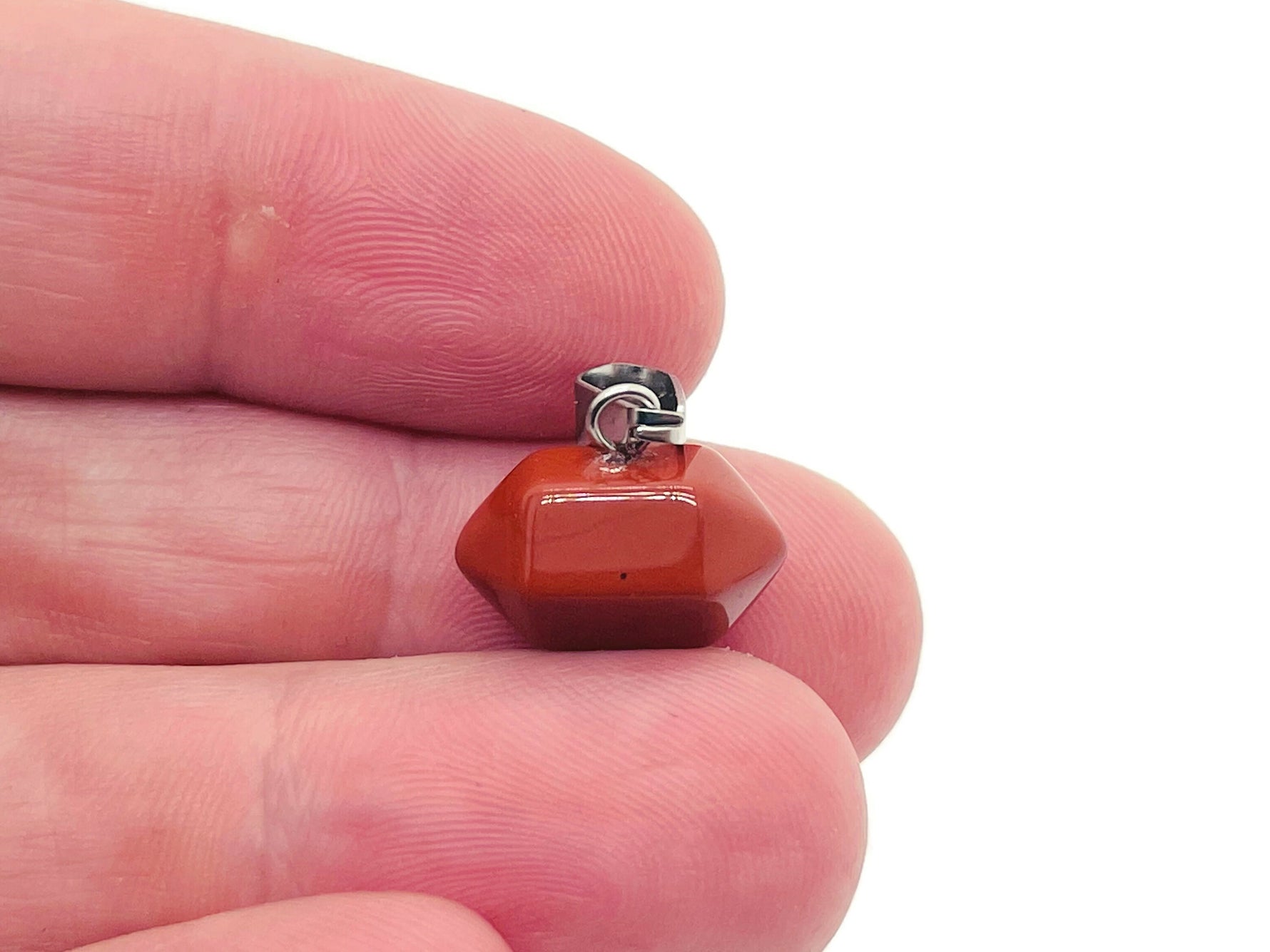 Red Jasper Point crystal pendant from GemstoneGO, featuring a polished red jasper stone suitable for jewelry making.