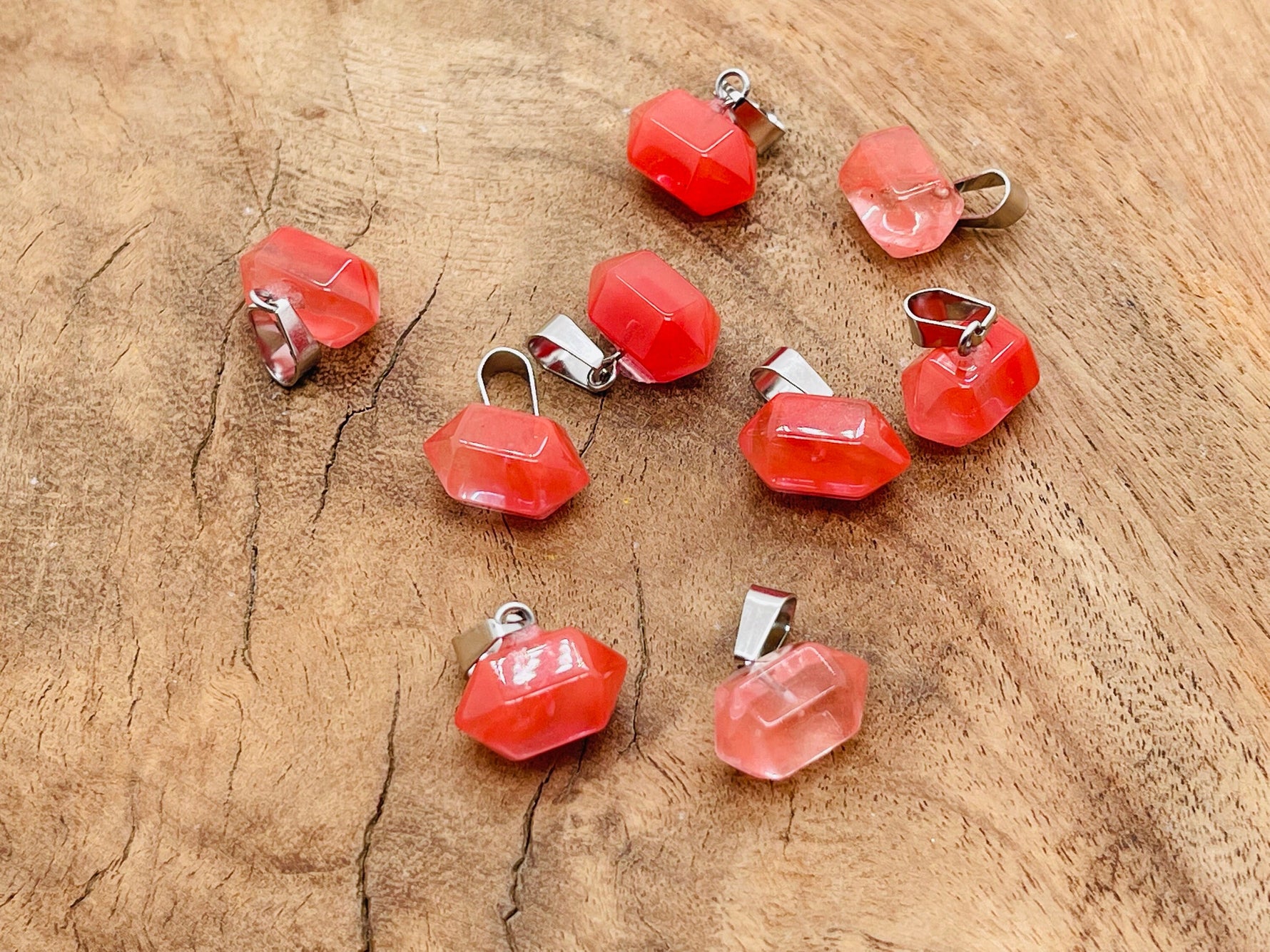 Cherry Quartz point crystal pendant from GemstoneGO, showcasing a vibrant red quartz gemstone for jewelry making.