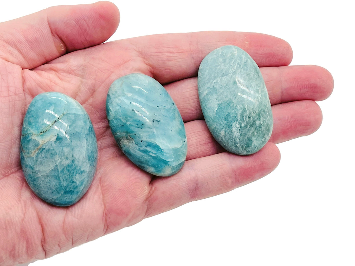 Amazonite palm gemstone spa stone from GemstoneGO, showing a smooth, polished blue-green healing crystal for massage and relaxation.
