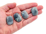 Labradorite flat gemstone slab from GemstoneGO with iridescent, polished surface showcasing natural stone patterns and colors.