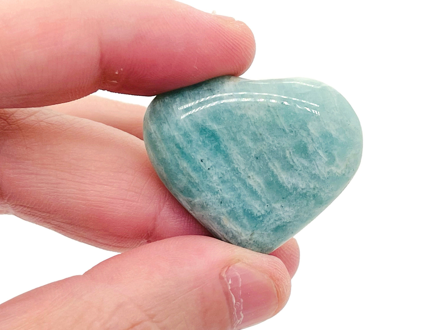 Amazonite heart-shaped gemstone from GemstoneGO, showcasing vibrant blue-green color and smooth polished surface.