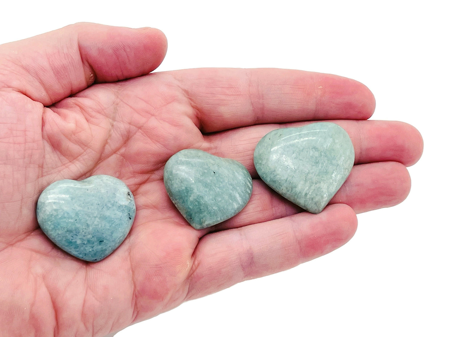 Amazonite heart-shaped gemstone from GemstoneGO, showcasing vibrant blue-green color and smooth polished surface.