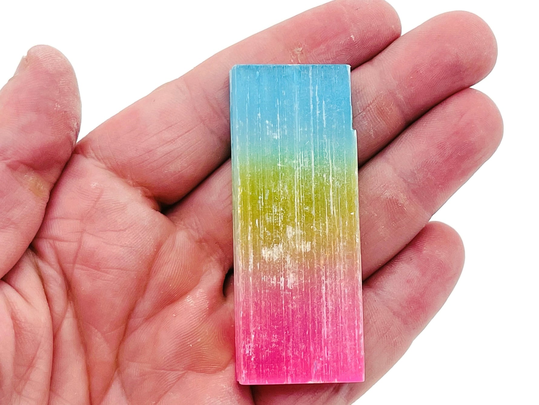 Rainbow Aura Selenite wand with vibrant rainbow hues, raw gemstone stick in various lengths, from GemstoneGO.