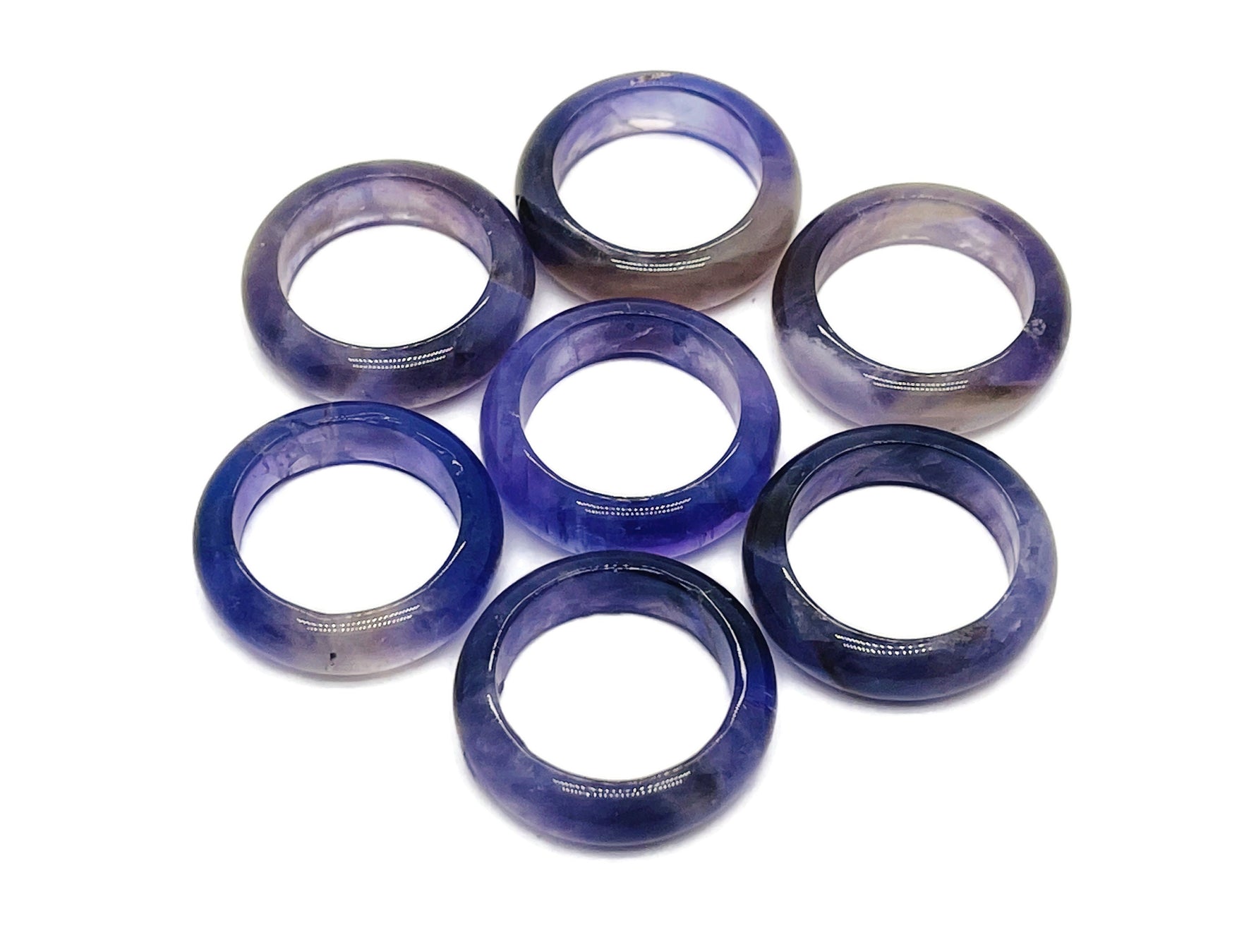 Amethyst crystal ring by GemstoneGO featuring a large purple gemstone set in silver jewelry design.