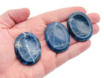 Sodalite worry stone from GemstoneGO, 4.5x3.5cm soothing crystal with deep blue and white natural patterns, handheld for stress relief.