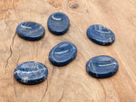 Sodalite worry stone from GemstoneGO, 4.5x3.5cm soothing crystal with polished surface for stress relief and meditation.