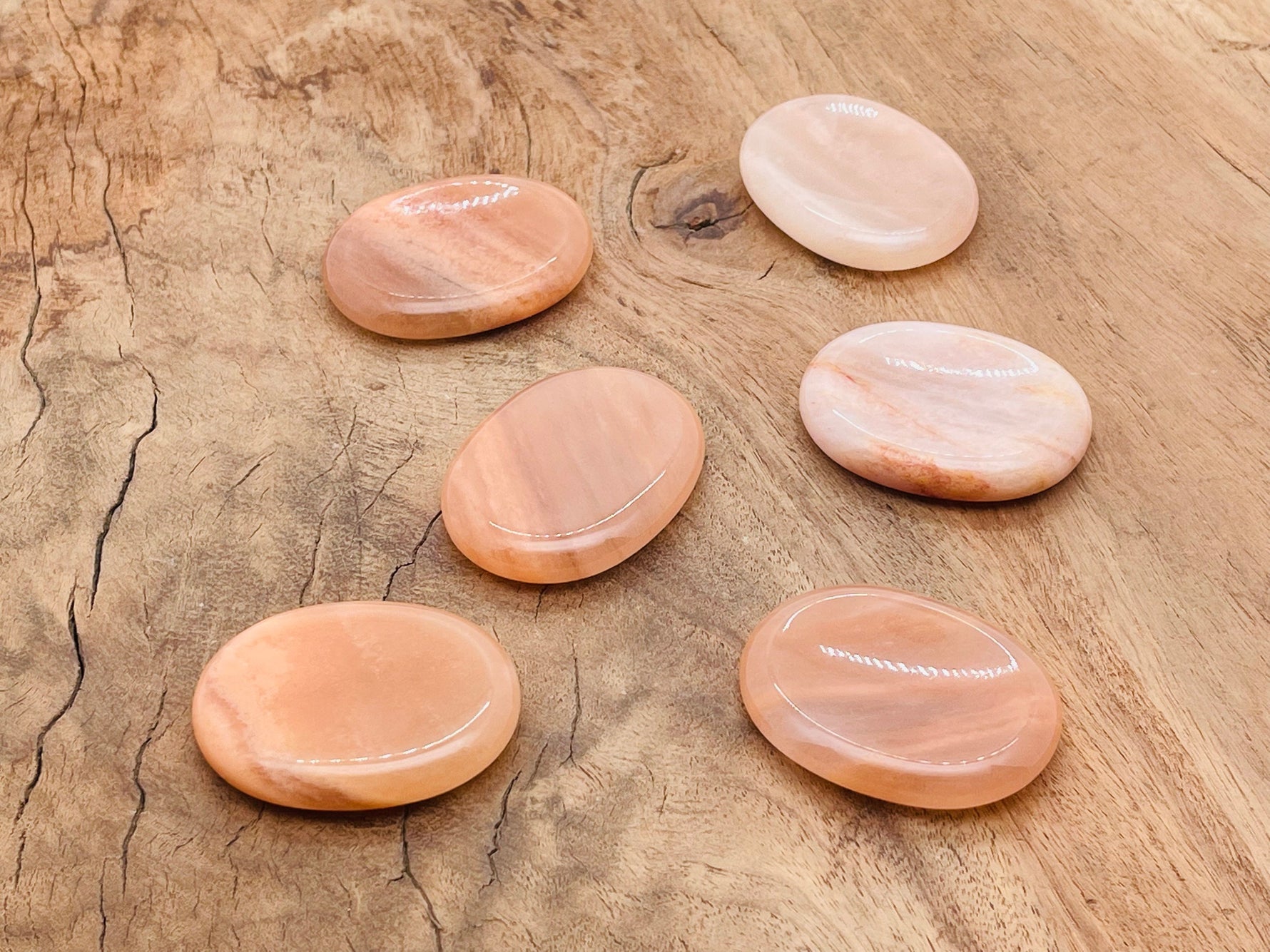Orange aventurine worry stone from GemstoneGO, 4.5x3.5cm soothing crystal for stress relief and meditation.