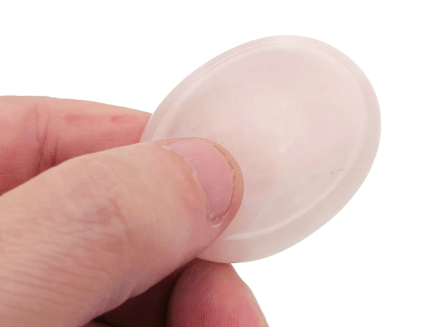 Rose quartz worry stone from GemstoneGO, 4.5x3.5cm soothing crystal for stress relief and meditation.