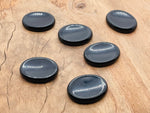 Obsidian worry stone from GemstoneGO, 4.5x3.5cm soothing crystal for stress relief and meditation practice.