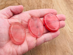 Cherry Quartz worry stone from GemstoneGO, 4.5x3.5cm, smooth polished crystal for stress relief and calming rituals.