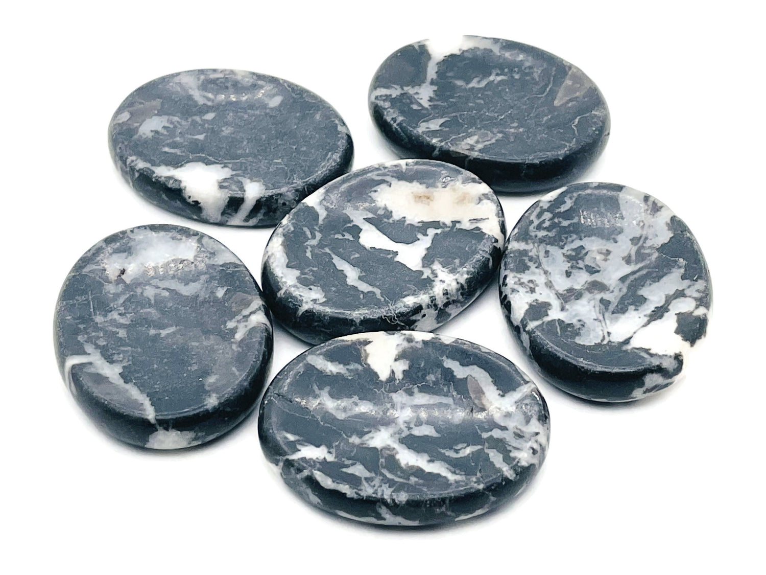 Zebra Calcite worry stone from GemstoneGO, showing black and white striped pattern, smooth polished surface, 4.5x3.5cm crystal.