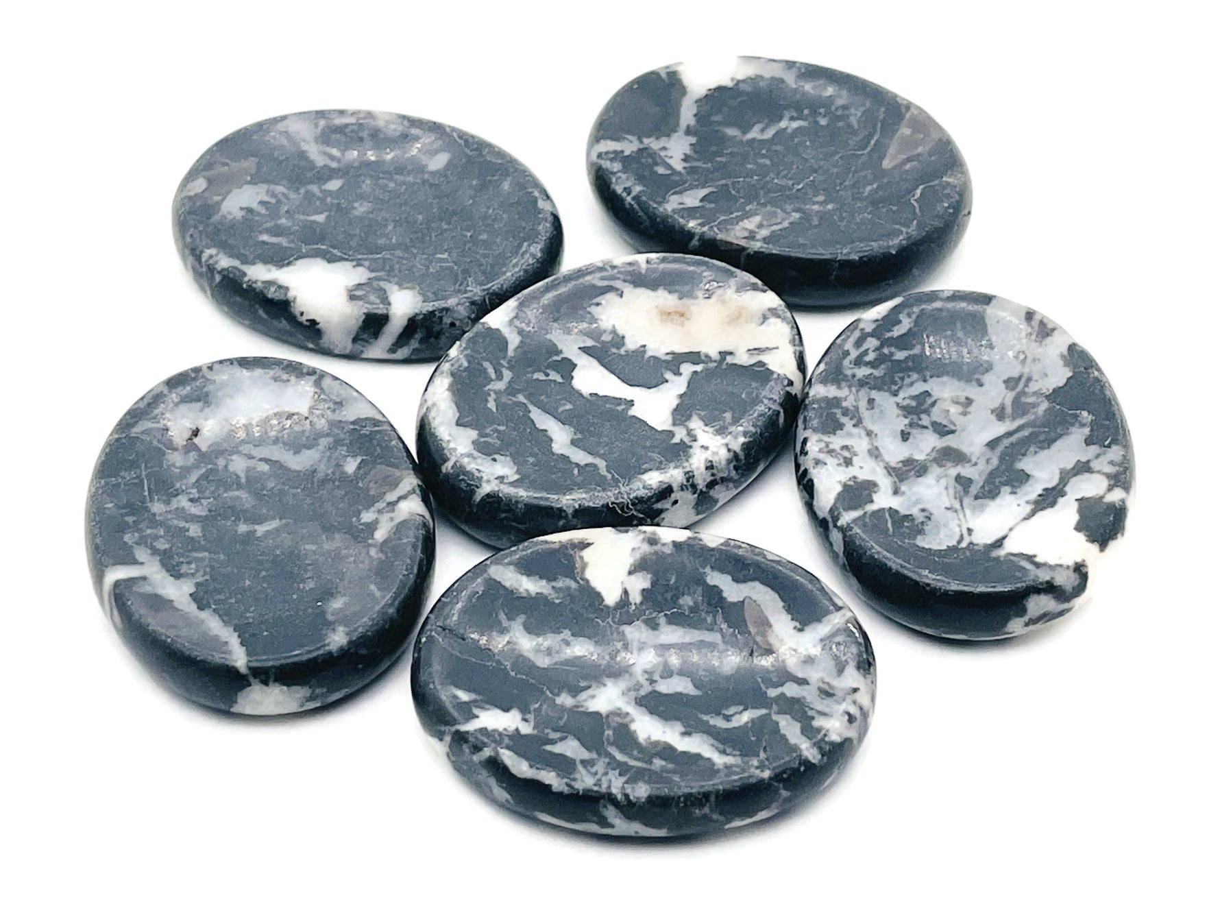Zebra Calcite worry stone from GemstoneGO, showing black and white striped pattern, smooth polished surface, 4.5x3.5cm crystal.