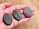 Dragon Blood Jasper worry stone from GemstoneGO, smooth 4.5x3.5cm soothing crystal for stress relief and meditation.