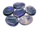 Amethyst worry stone from GemstoneGO, 4.5x3.5cm, featuring polished purple crystal for soothing stress relief and meditation.