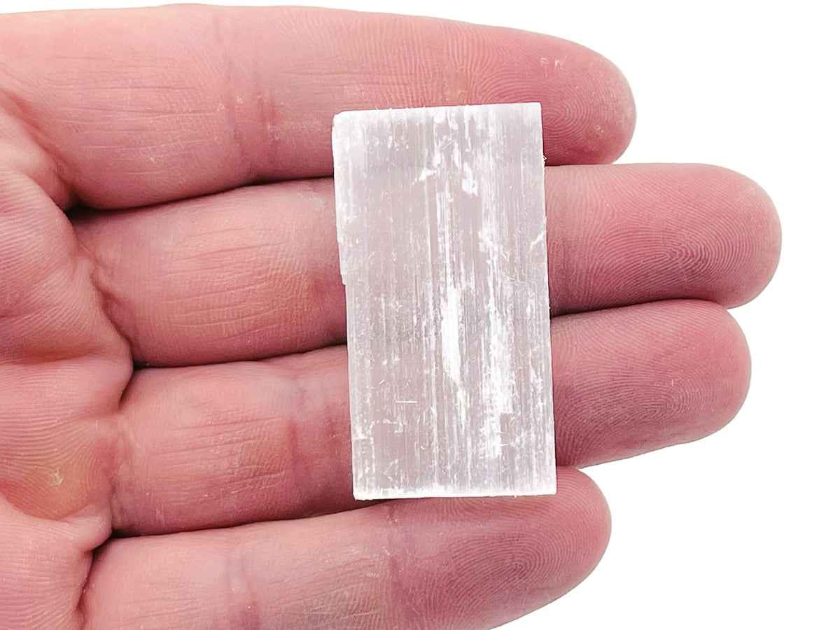 Raw Selenite wand stone from GemstoneGO, 4-12cm stick, natural translucent mineral for healing and spiritual energy.