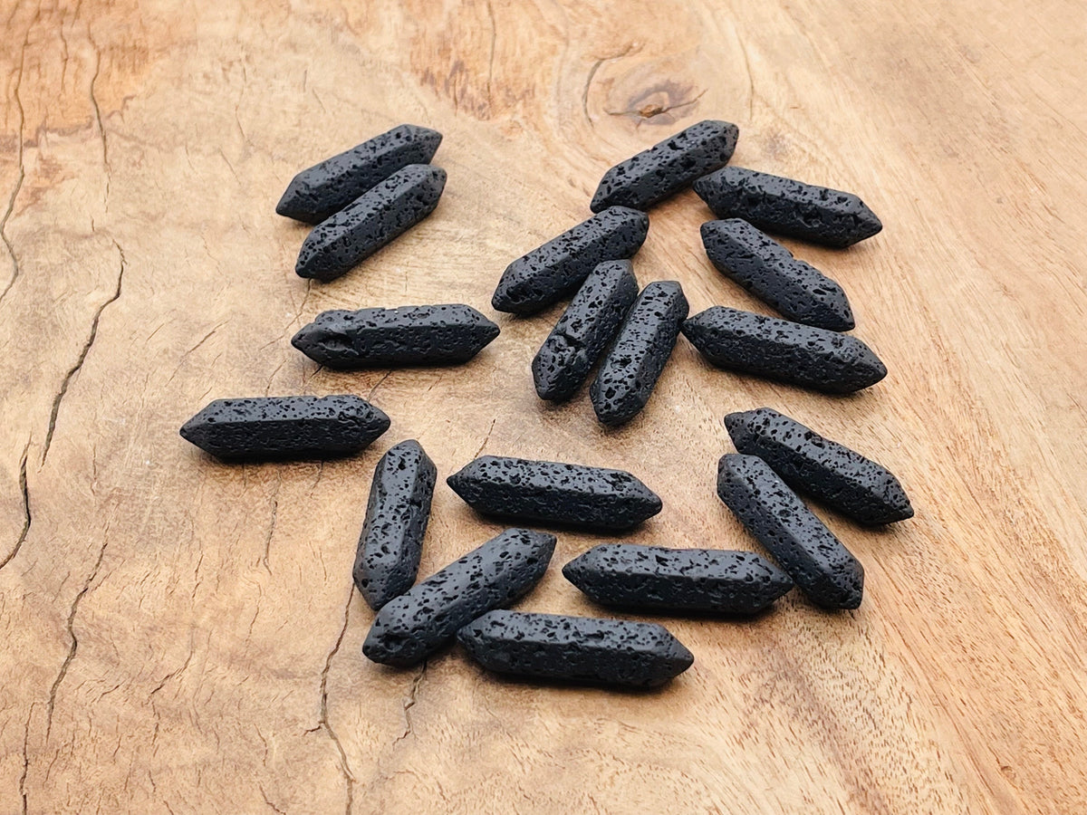 Lava volcanic carved terminated point gemstone, 33mm, natural black stone with textured surface, from GemstoneGO.