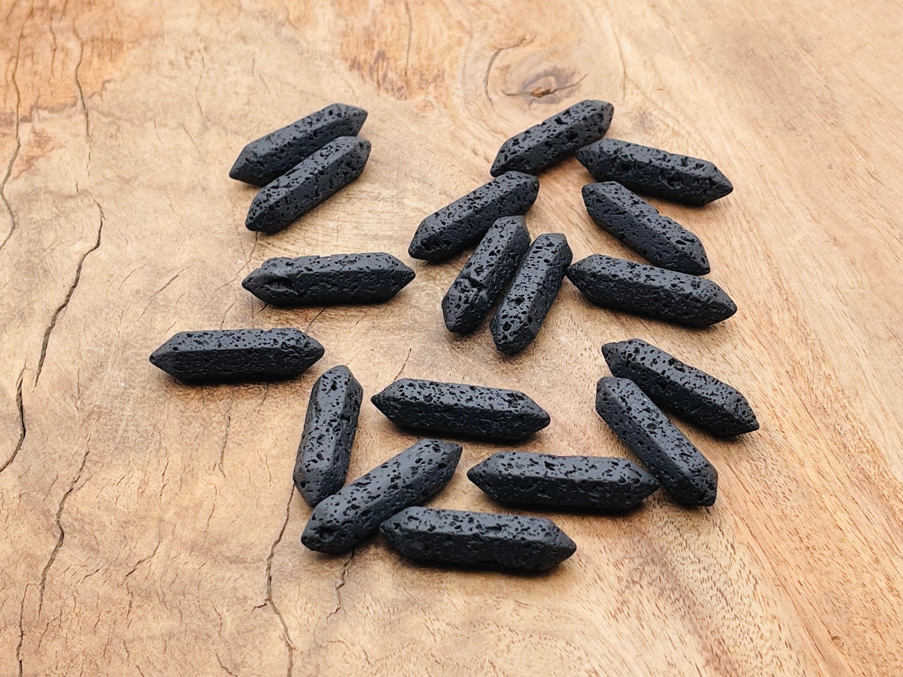 Lava volcanic carved terminated point gemstone, 33mm, natural black stone with textured surface, from GemstoneGO.