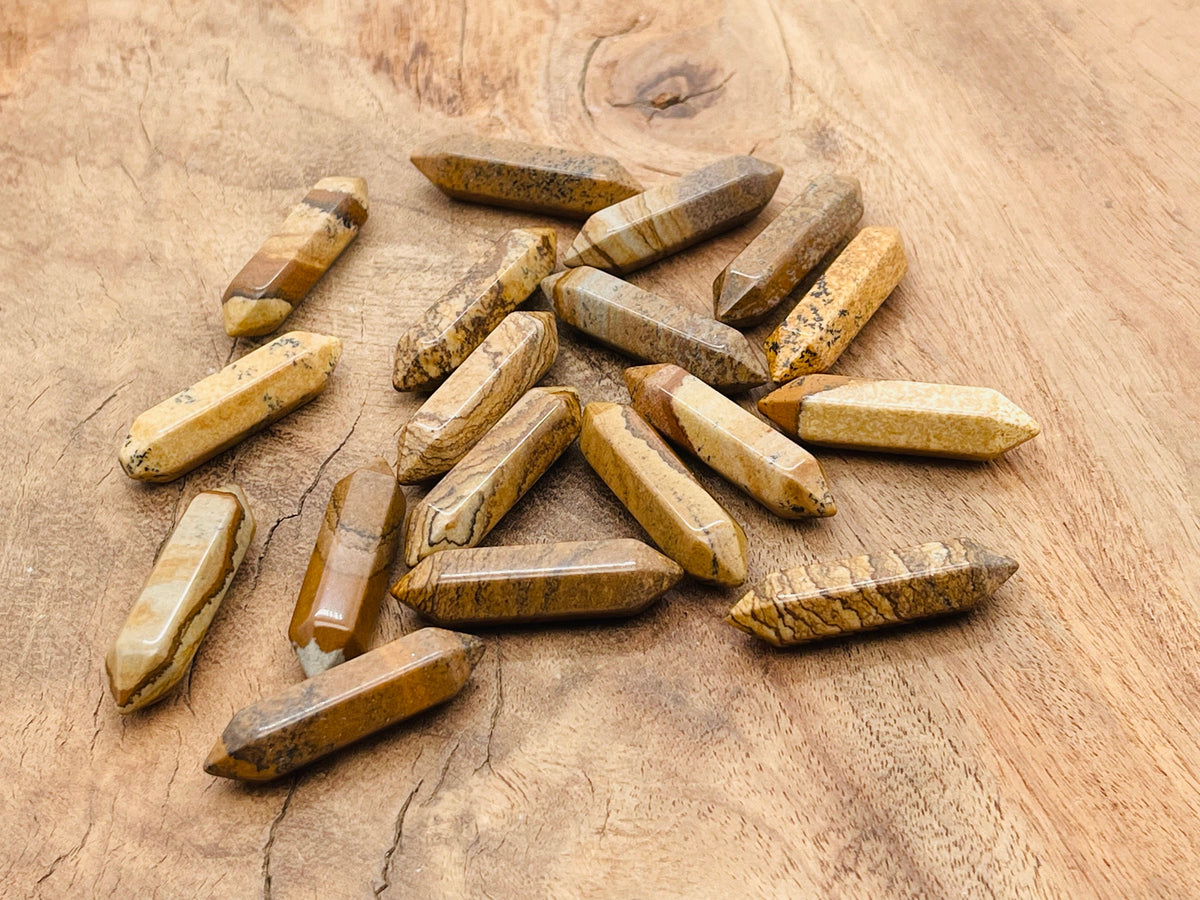 Picture Jasper terminated carved point gemstone from GemstoneGO, 33mm, showcasing its natural earthy patterns and polished surface.