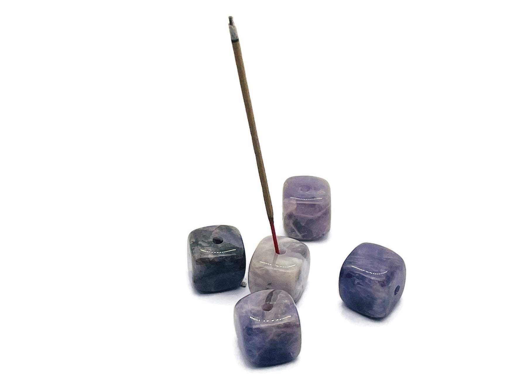 Handmade amethyst crystal incense holder with carved details, designed for incense sticks, from GemstoneGO.