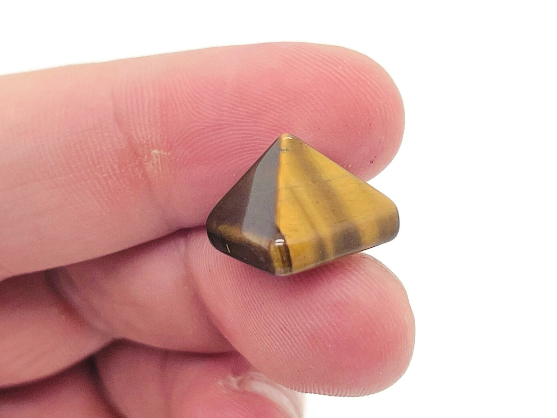 14mm Tiger Eye pyramid gemstone carving from GemstoneGO, featuring a polished, natural tiger eye stone with banded golden brown pattern.