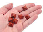 Red Jasper pyramid gemstone carving, 14mm, from GemstoneGO, showcasing a polished red jasper pyramid with natural patterns.