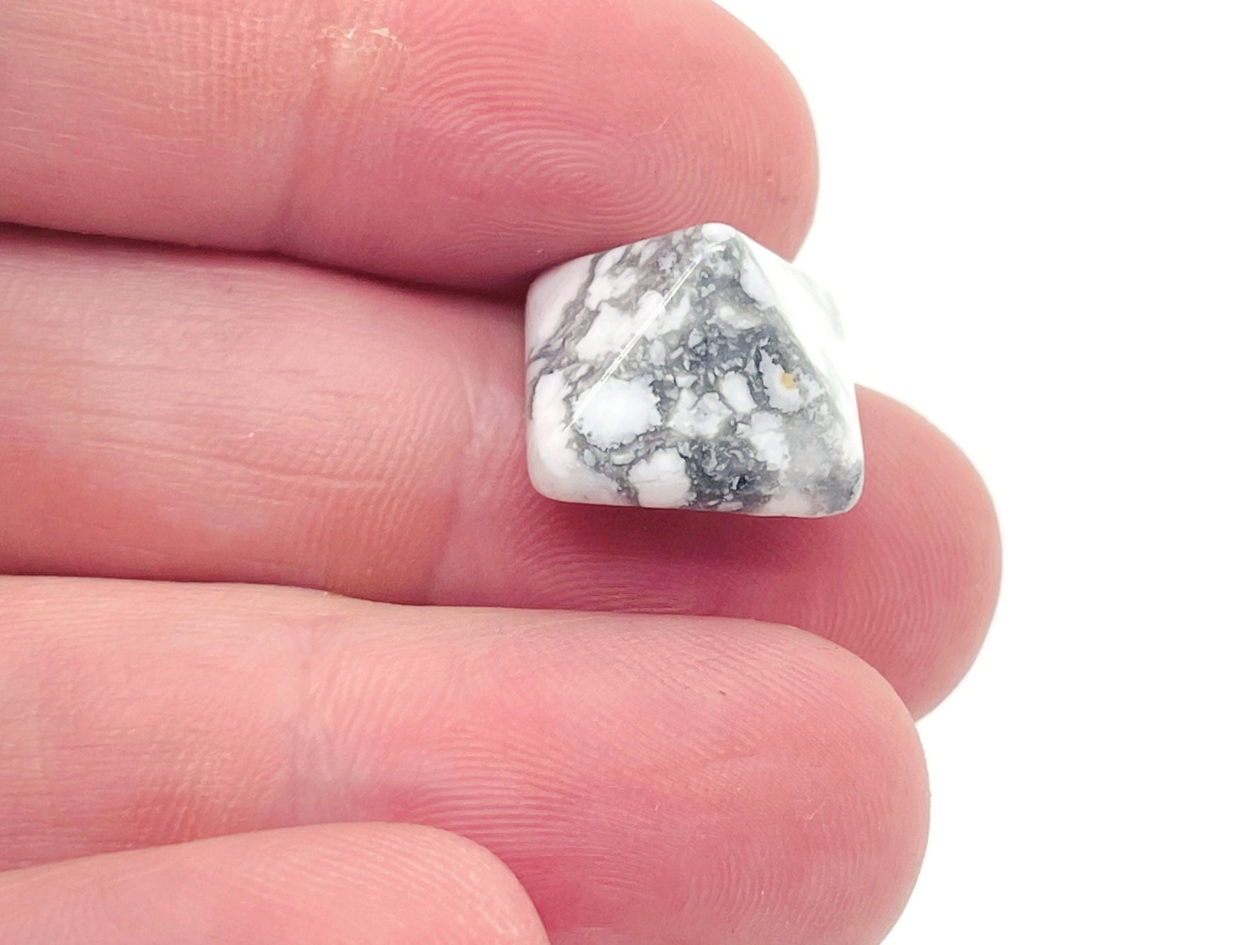 14mm Howlite pyramid gemstone carving by GemstoneGO, smooth white stone with gray veining, ideal for jewelry or decor.