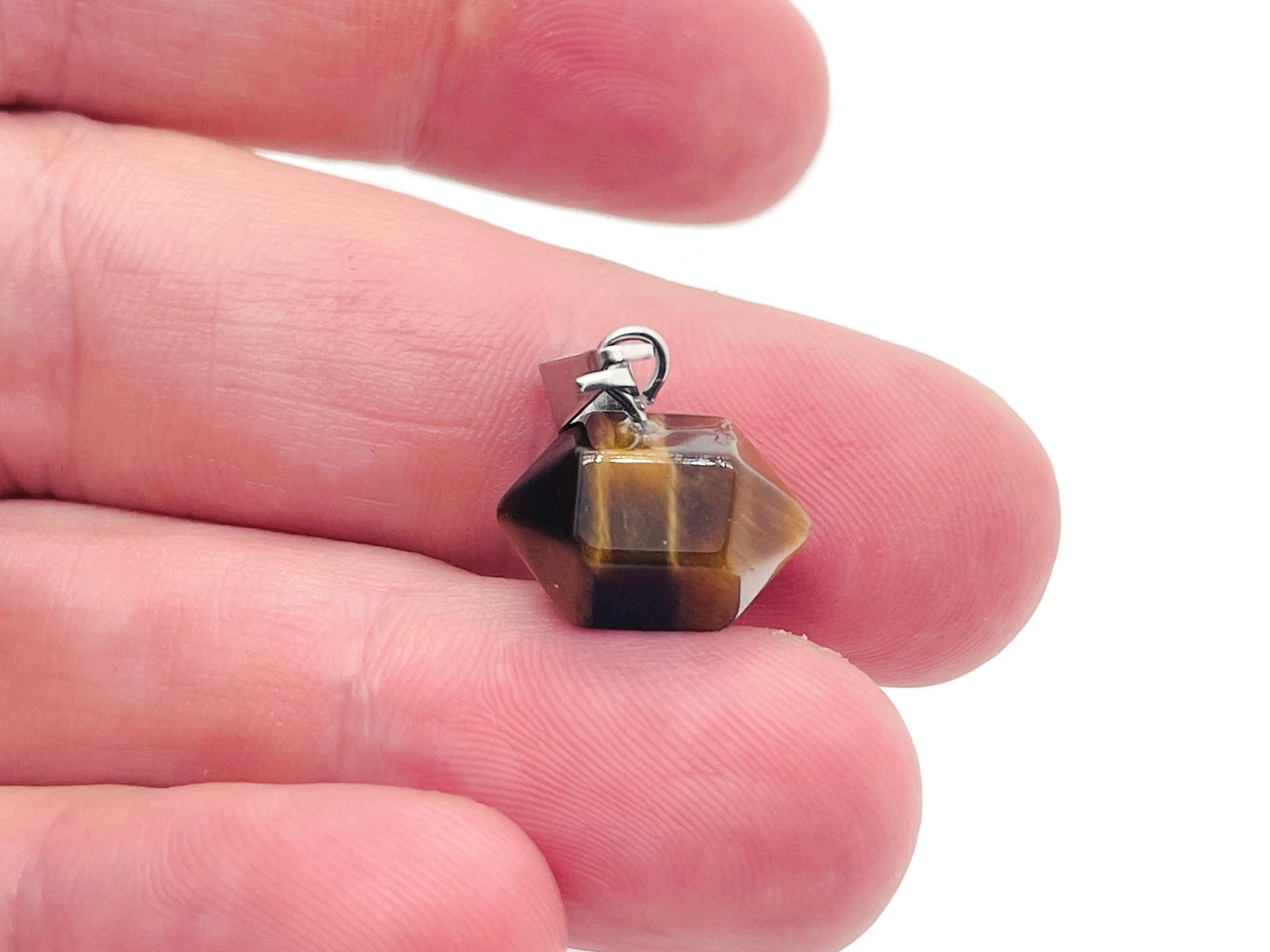 Tiger Eye Point crystal pendant from GemstoneGO, showcasing a polished gemstone with warm golden-brown hues for jewelry making.