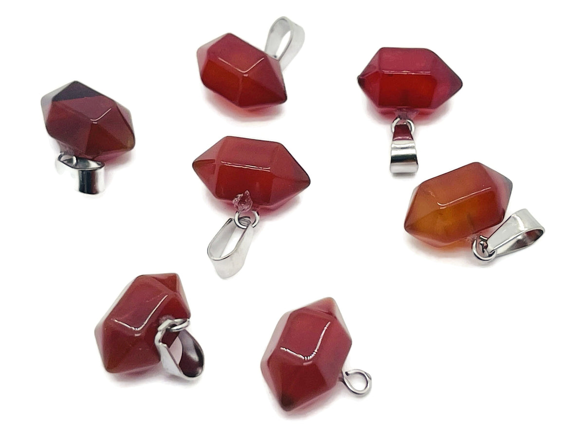 Carnelian point crystal pendant from GemstoneGO, gemstone for jewelry making, showcasing a vibrant orange-red stone with a pointed shape.