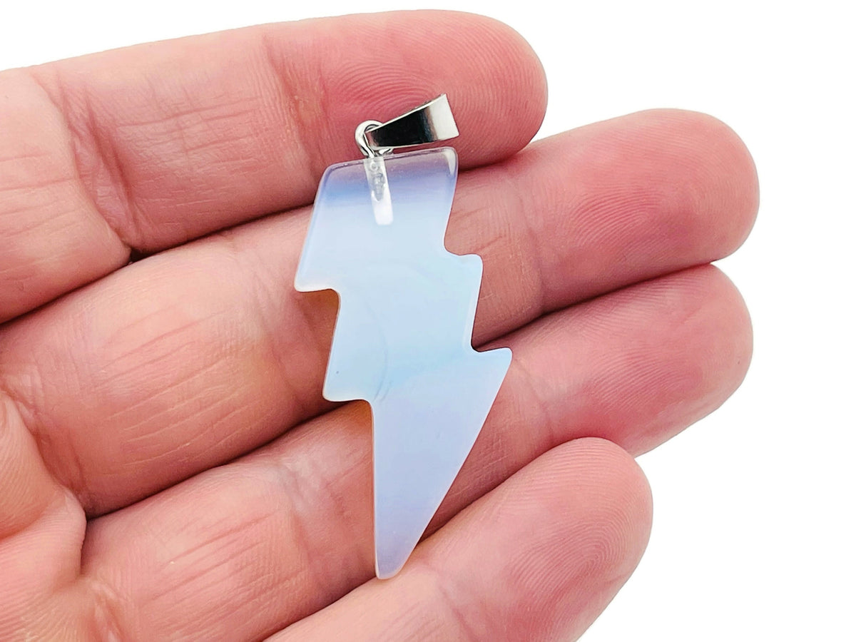 Opalite Lightning Crystal Pendant from GemstoneGO featuring a luminous lightning-shaped opalite gemstone on a silver chain.