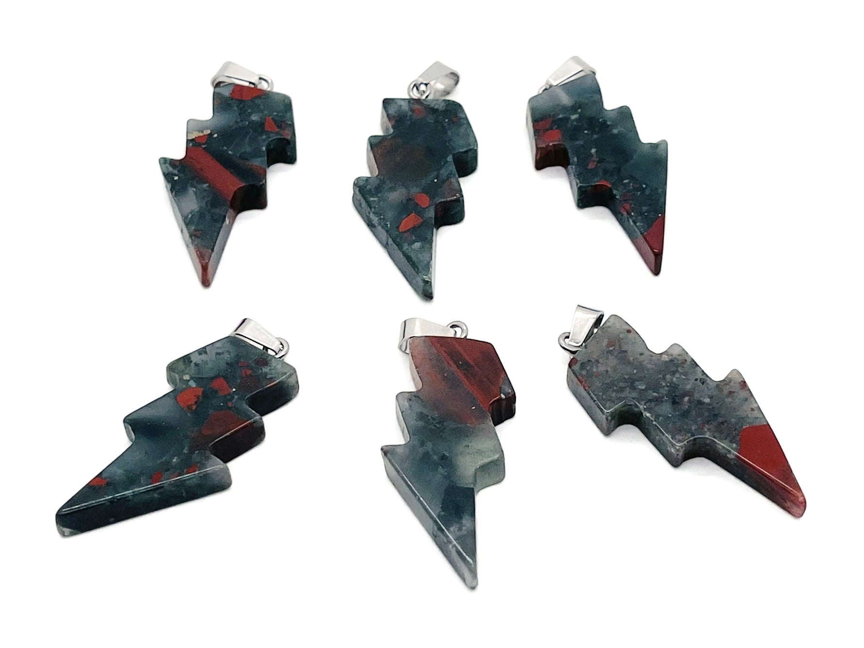 African Bloodstone Lightning Crystal pendant featuring a striking lightning stone gemstone on a silver chain.