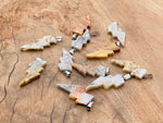 Crazy Lace Agate Lightning Crystal pendant from GemstoneGO featuring a vibrant lightning stone with intricate patterns and natural crystal details.