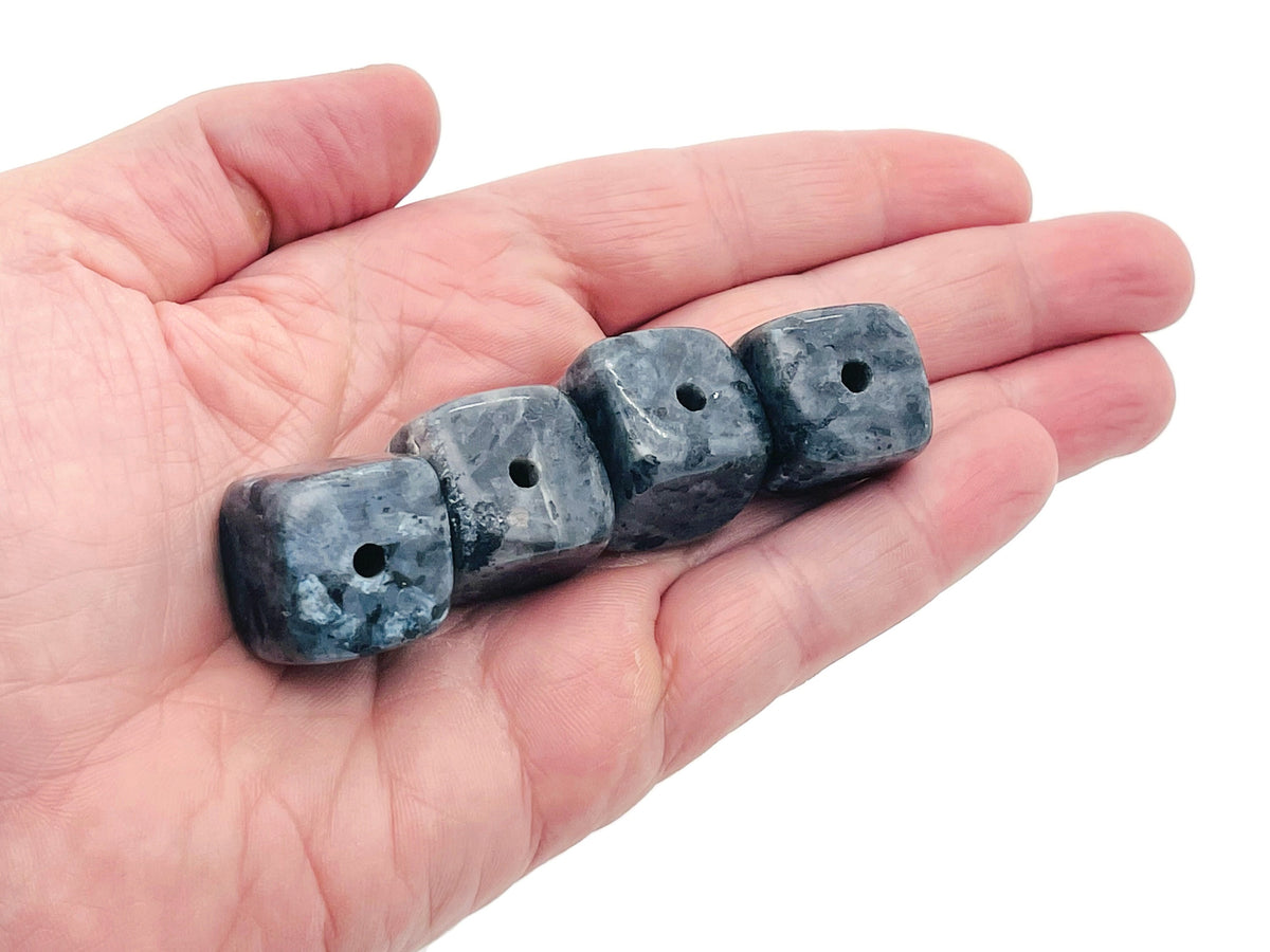 Larvikite crystal incense holder with carved stone design, handmade gemstone stick holder for aromatic incense sticks.