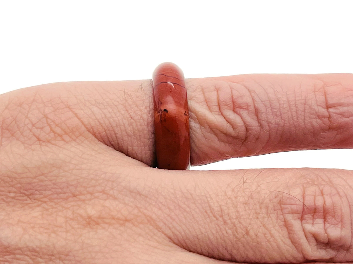 Red Jasper crystal ring by GemstoneGO featuring a vibrant red gemstone set in a silver band.