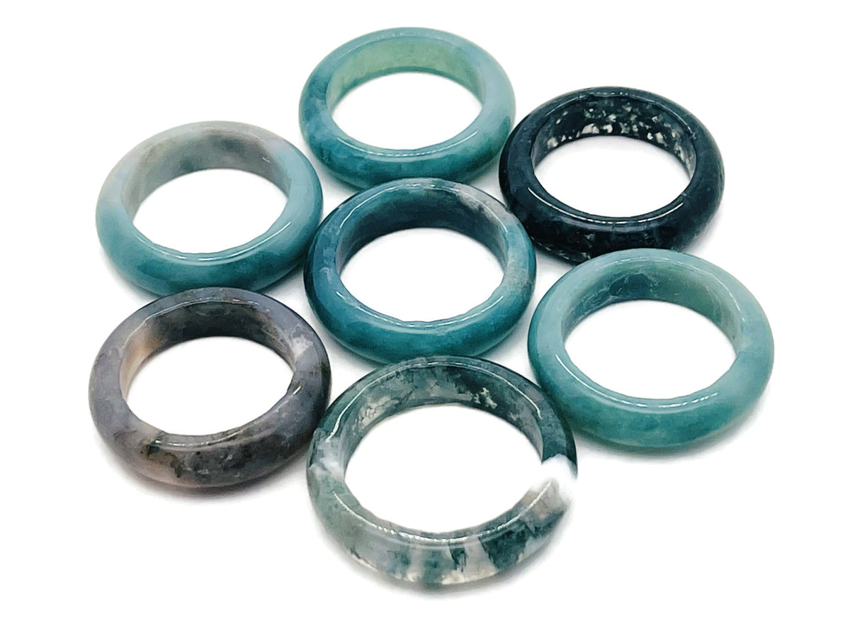 Moss agate crystal ring from GemstoneGO featuring a polished moss agate gemstone set in a silver band.