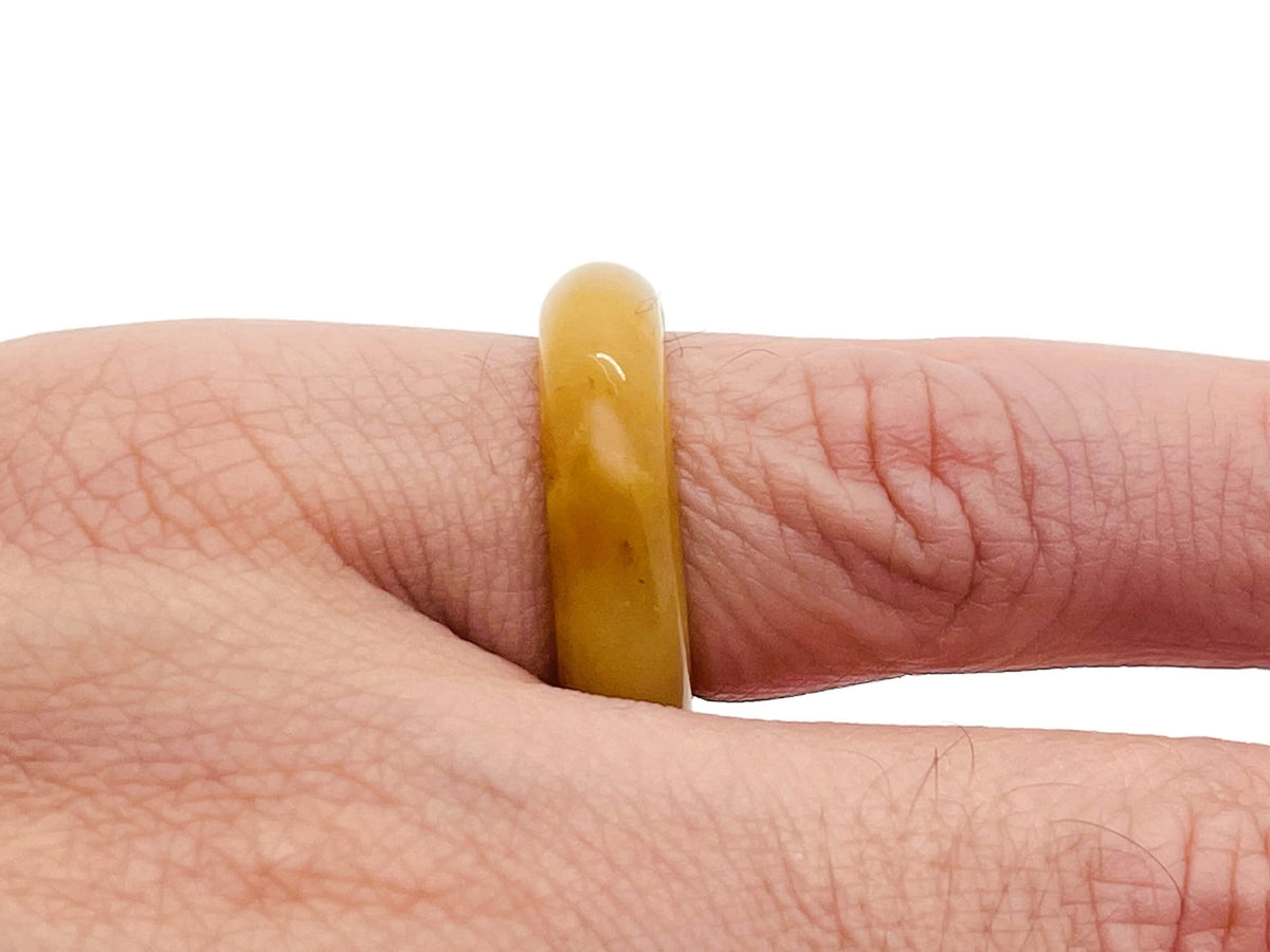 Yellow aventurine crystal ring by GemstoneGO featuring a polished yellow gemstone set in a silver band.
