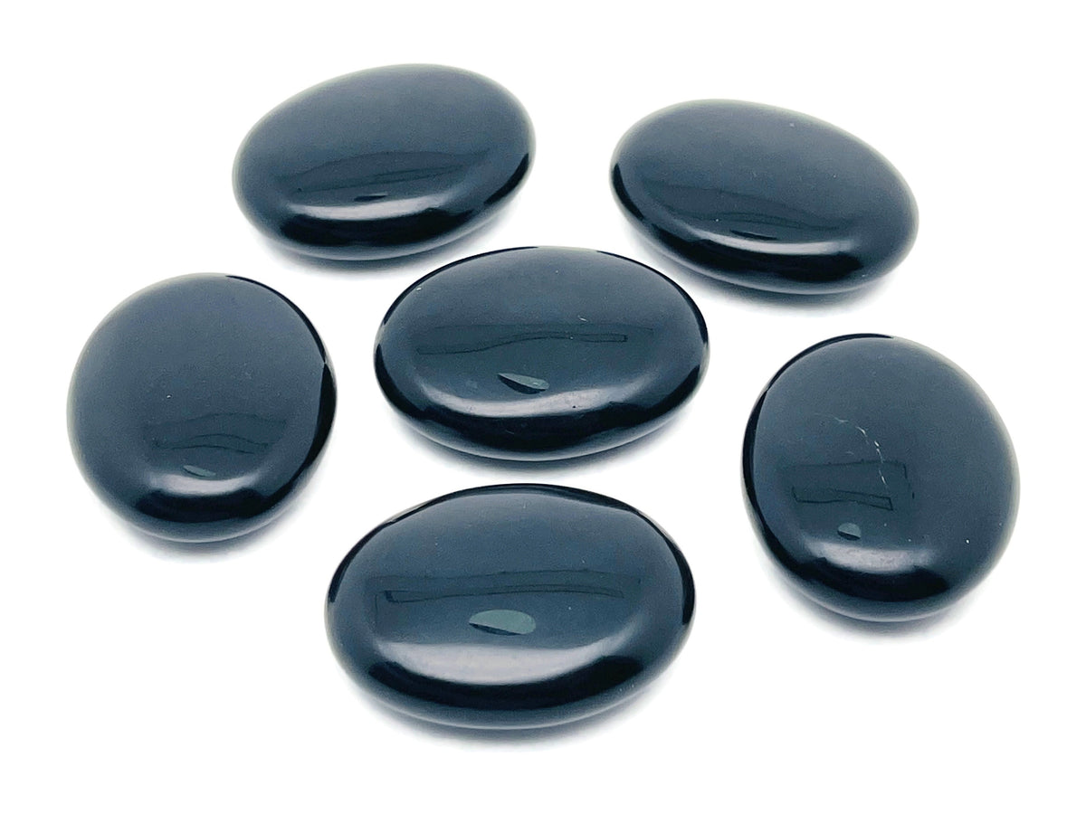 Obsidian palm gemstone spa stone, 45x35mm, from GemstoneGO, showing smooth, polished black volcanic stone for relaxation and massage.