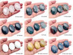 Oval gemstone spa stone in mixed colors, 45x35mm, from GemstoneGO, used for relaxation and crystal healing.