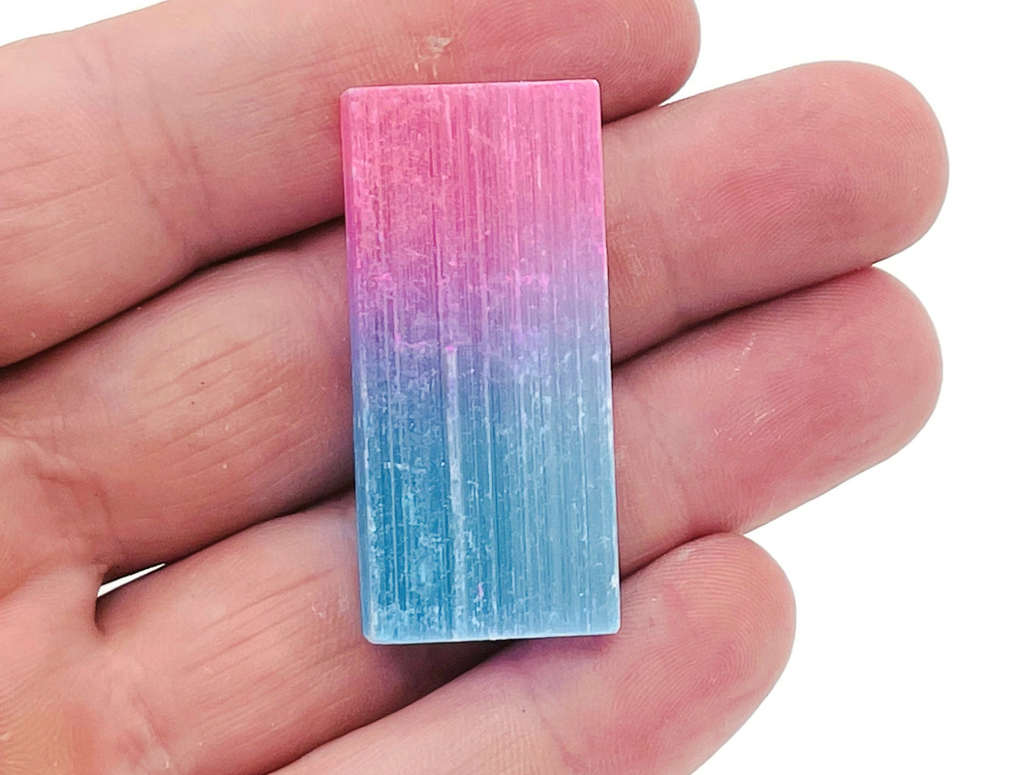 Rainbow Aura Selenite Wand gemstone in various sizes, raw aura finish, featuring vibrant rainbow hues and natural crystal texture.