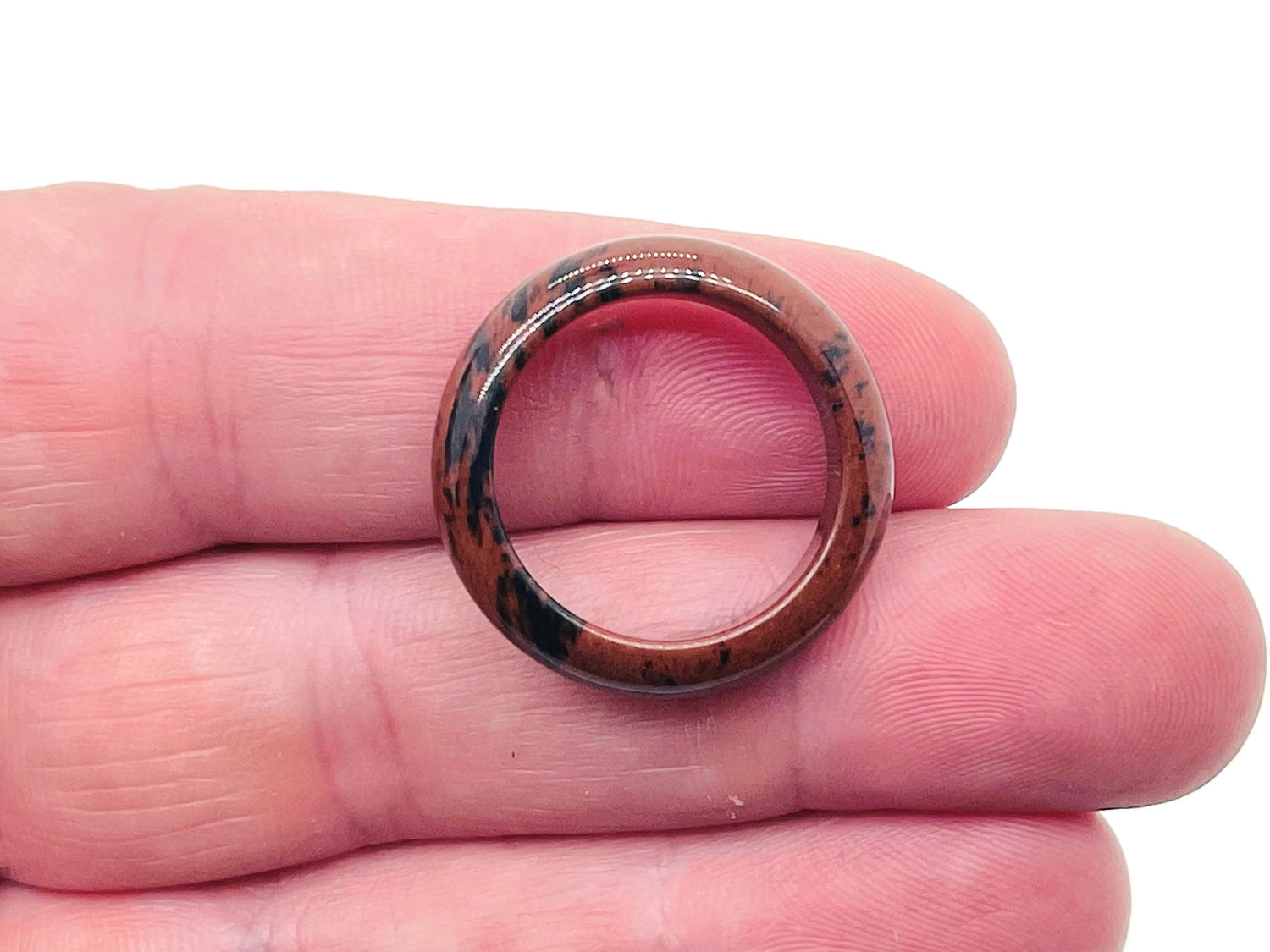 Mahogany Obsidian crystal ring by GemstoneGO featuring a polished mahogany-colored obsidian gemstone on a sleek band