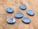 Blue Spot Jasper worry stone with soothing crystal design, measuring 4.5x3.5cm, from GemstoneGO.