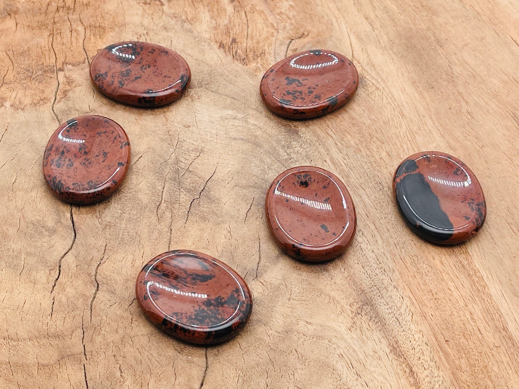 Mahogany Obsidian worry stone from GemstoneGO, 4.5x3.5cm, smooth and polished crystal for stress relief and meditation.