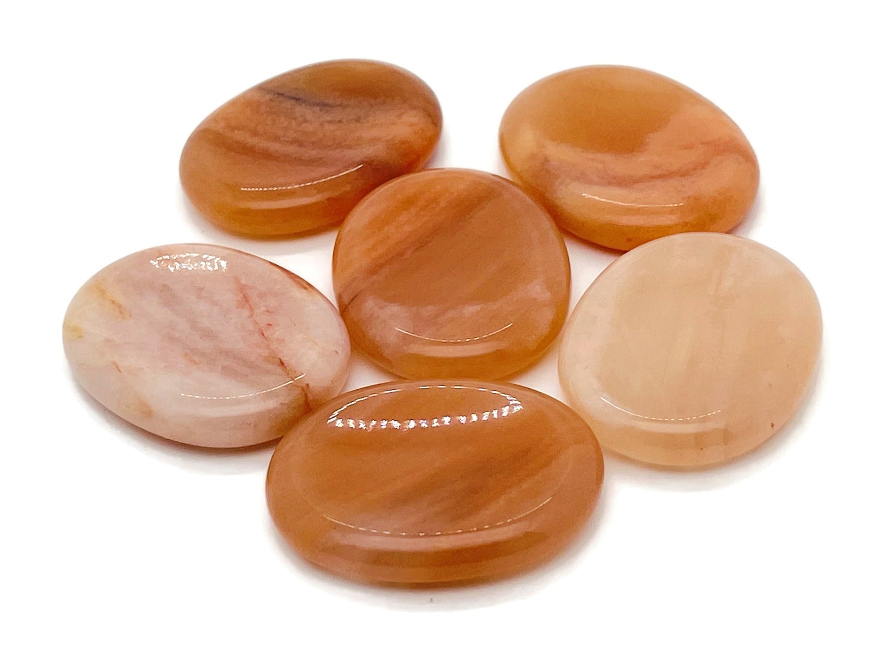 Orange aventurine worry stone from GemstoneGO, 4.5x3.5cm soothing crystal for stress relief and meditation.