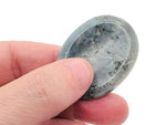 Labradorite worry stone from GemstoneGO, 4.5x3.5cm, featuring iridescent, soothing crystal surface for stress relief and meditation.