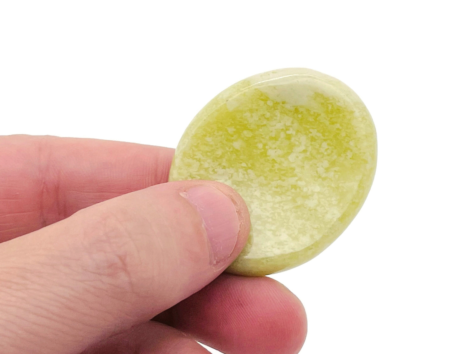 Smooth jade worry stone from GemstoneGO, measuring 4.5x3.5cm, featuring a polished, soothing crystal surface for stress relief.